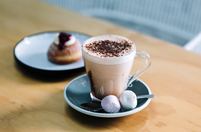 Hot chocolate and doughnut at Gather Foodhouse, Hamilton.