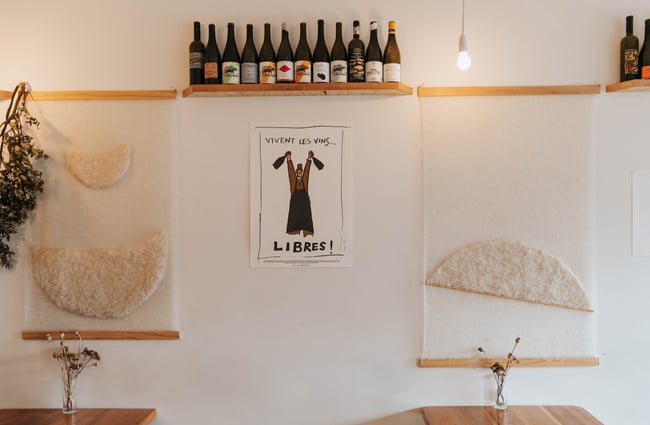 Art and wine on the walls inside Gatherings in Christchurch.