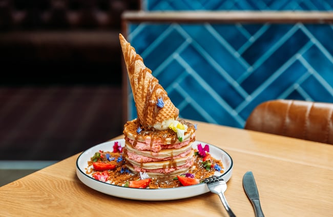 A colourful stack of pancakes on the table at Gear Street Union.
