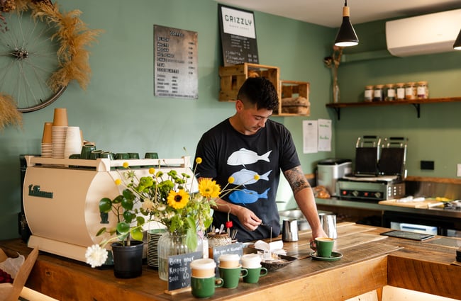 Barista making coffee at General Post, Christchurch.