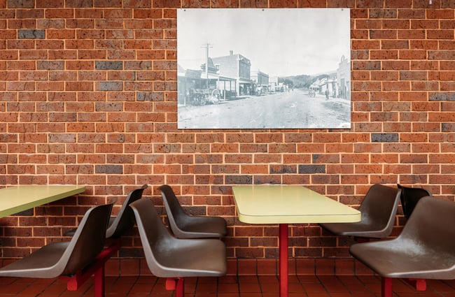 A close up of brown and green outdoor seating.