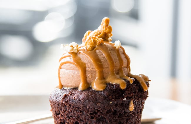 Chocolate cupcake with caramel sauce.
