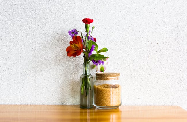 Flowers and sugar as table setting.