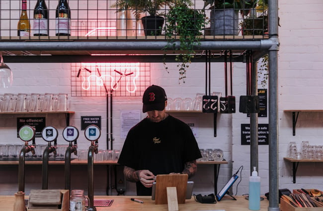 A staff member working behind the counter.