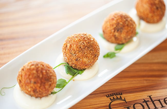 Close up of a narrow plate of food.