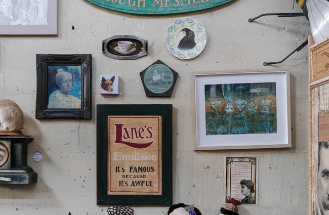 Donna Demente artworks on the wall at Grainstone Gallery in Ōamaru.