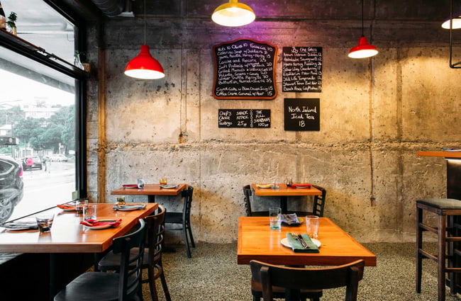 The small seating area inside the brightly lit Graze Wine Bar in Wellington.