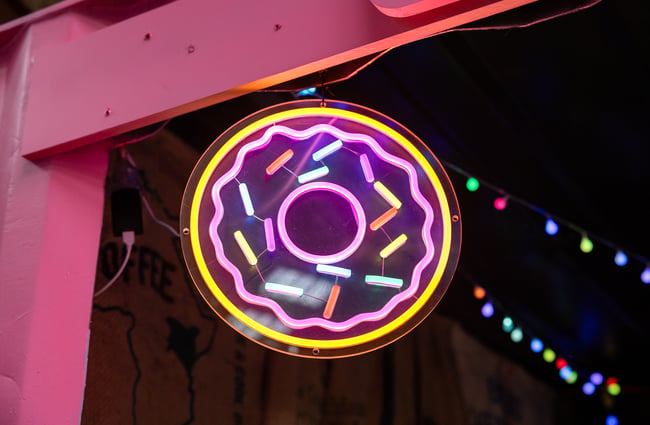 Neon donut sign at Grumpys.