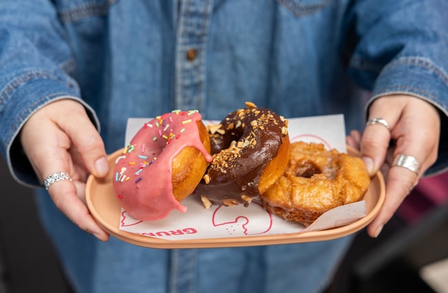 Three donuts on a plate at Grumpys.