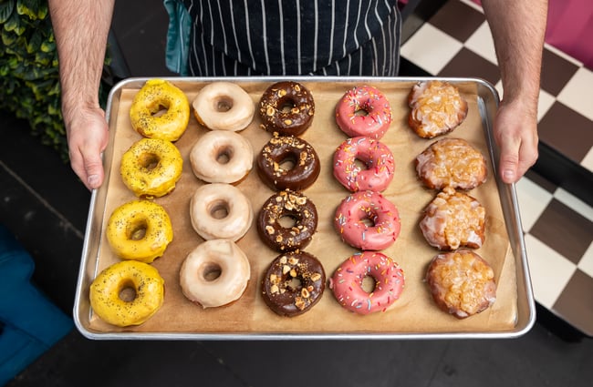A tray of colourful donuts at Grumpys.