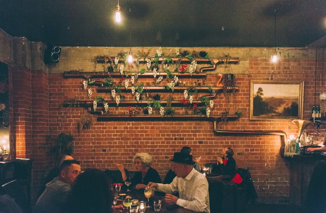 People dining in the bar.