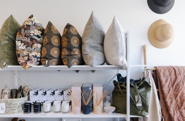 Cushions lined up on a shelf at Harakeke Florist in Christchurch.