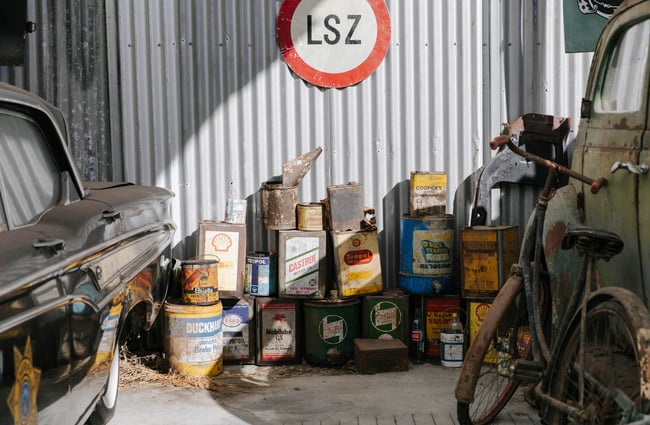 Stack of old petrol jerry cans.