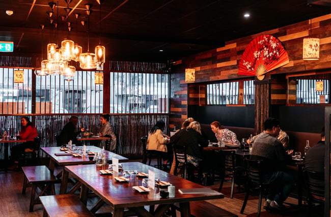Diners sitting at tables at Haru.