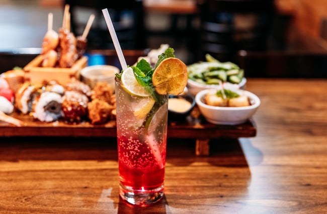 Drink and food dishes on table at HARU.