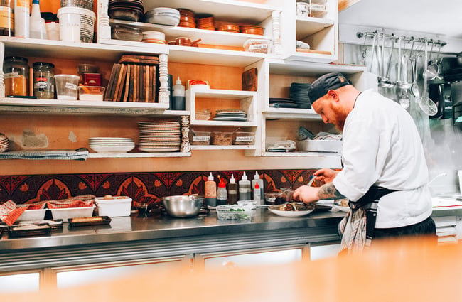 A chef preparing a meal.