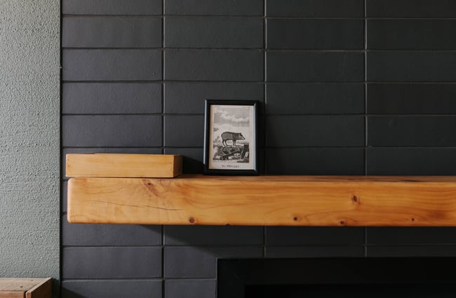 A little picture on a shelf.