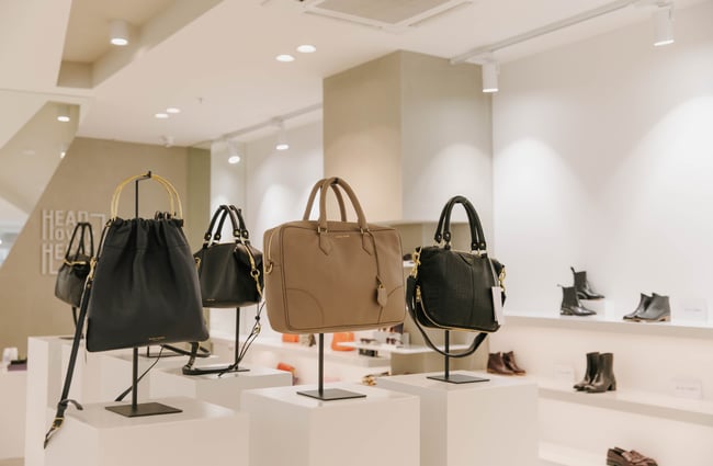 Bags on display on shelves at Head Over Heels in Christchurch.