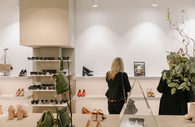 Two women browsing at Head Over Heels in Christchurch.