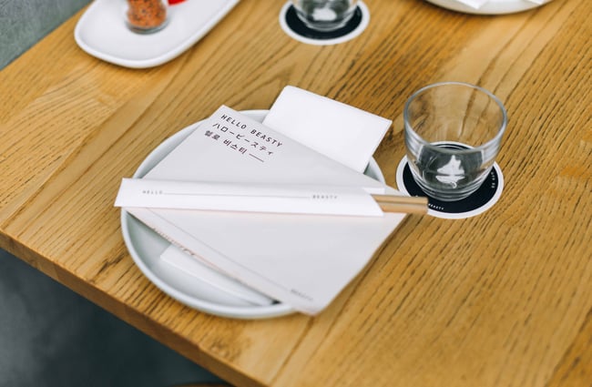 Hello Beasty menu and chopsticks at Hello Beasty, Auckland Viaduct Harbour.
