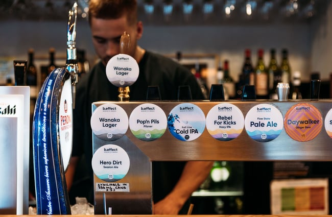 b.effect round beer badges across the tap frontage at hello RANGER's bar.