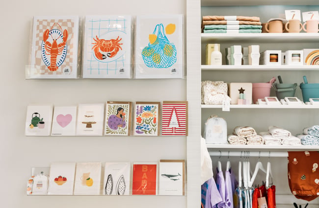 Colourful cards and cups on display.