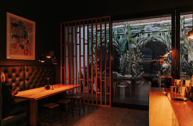 Looking into the covered outside area from inside the cafe.