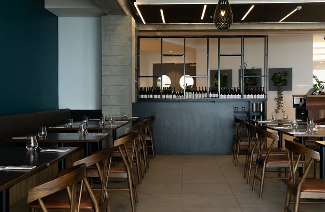 Empty chairs and tables in the restaurant.