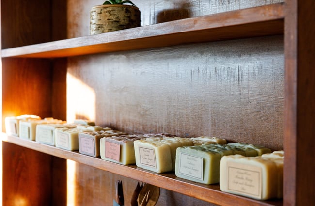 Soaps lined up on a shelf at Hill Road Orchard & Farm Shop.