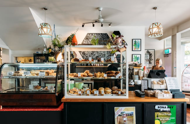 Cafe food in a glass cabinet.