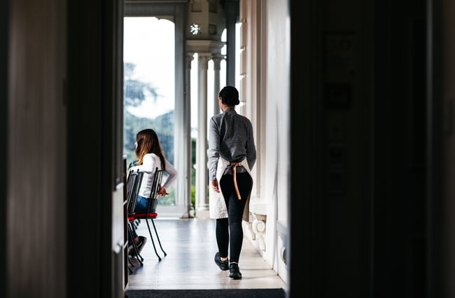 A woman walking outside.