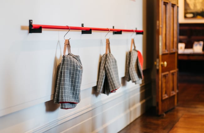 Aprons hanging up.