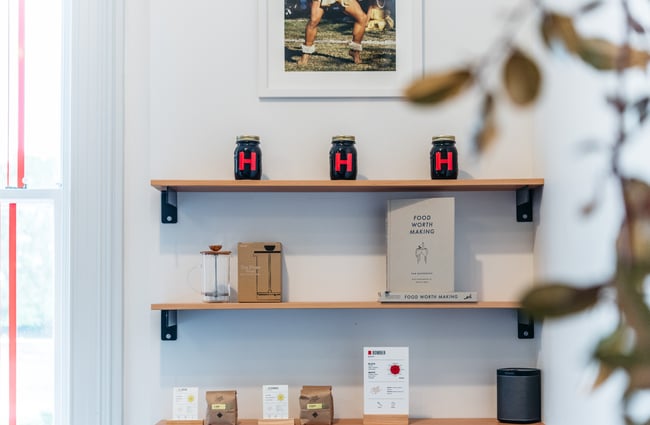 Coffee supplies on shelves.