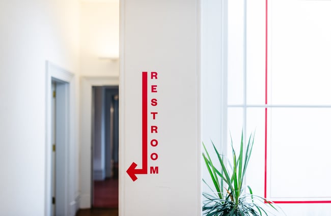 A rest room sign.