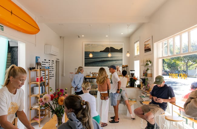 Busy cafe space with customers inside at Honey Sundays.