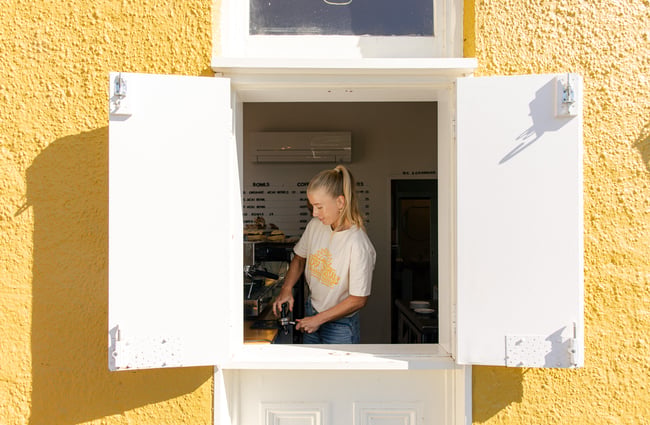 Barista through the window at Honey Sundays.