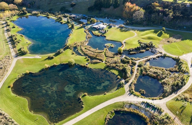 Drone shot of salmon ponds at Hook Wānaka.