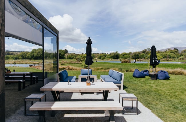 An outdoor seating area outside Hook restaurant.