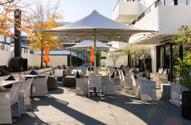 Outdoor seating at Hotel Montreal on a sunny day.