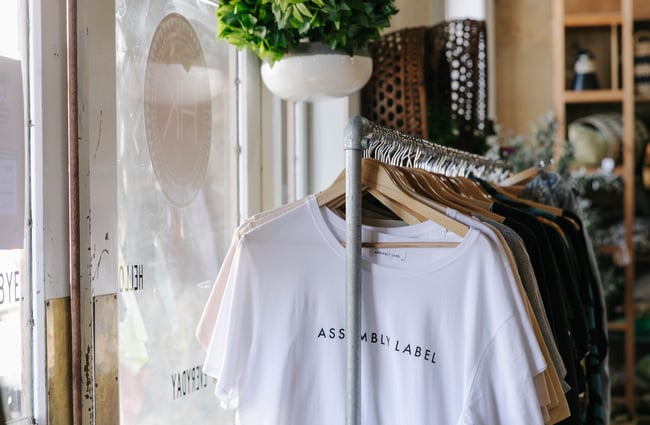 Rack of t-shirts at Housekeepers Design in Ōamaru.