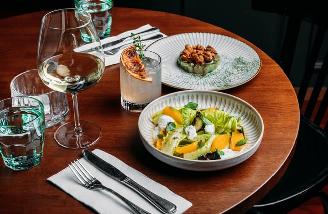 Dishes and glass of wine at Hummingbird.