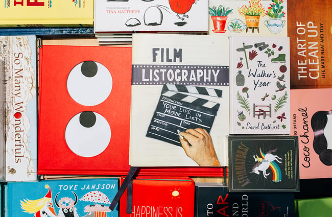A flatlay of books on a table inside Iko Iko Cuba Street, Wellington shop.