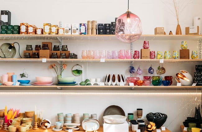 Shelves of speckled glasses, ceramics, candles, bowls and more at Inc. Design store in Ōamaru