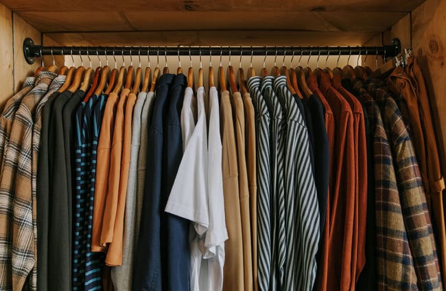 Men's tees and shirts on a rack at Indigo & Provisions, Christchurch.