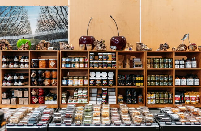 Shelves of honey and other preserves in the shop at Jackson Orchards.