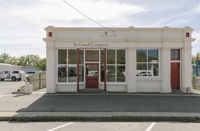The cream brick building of In Good Company Kurow.