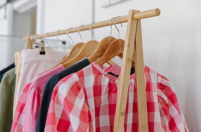 A close up of pink and white checked top.