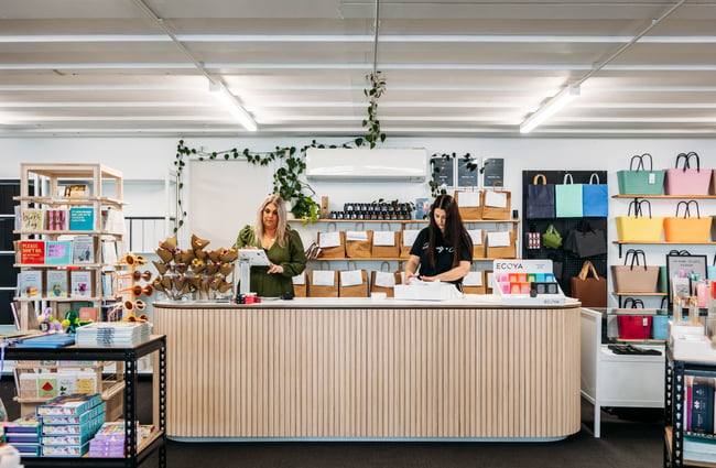 Shop assistants behind the front counter at Journey & Co.
