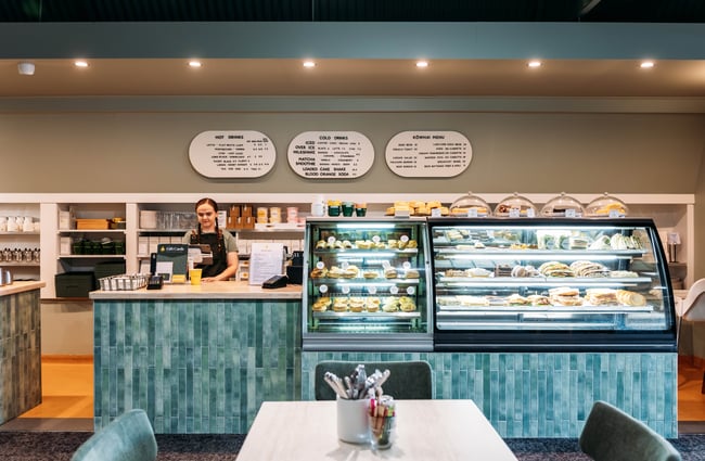 Blue front counter and food cabinet at Kōwhai Eatery.