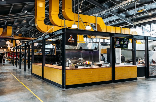 A yellow and black restaurant.